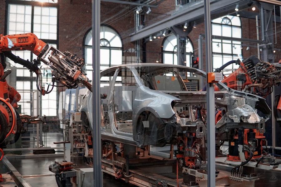 Automotive manufacturing and assembly line with industrial robots